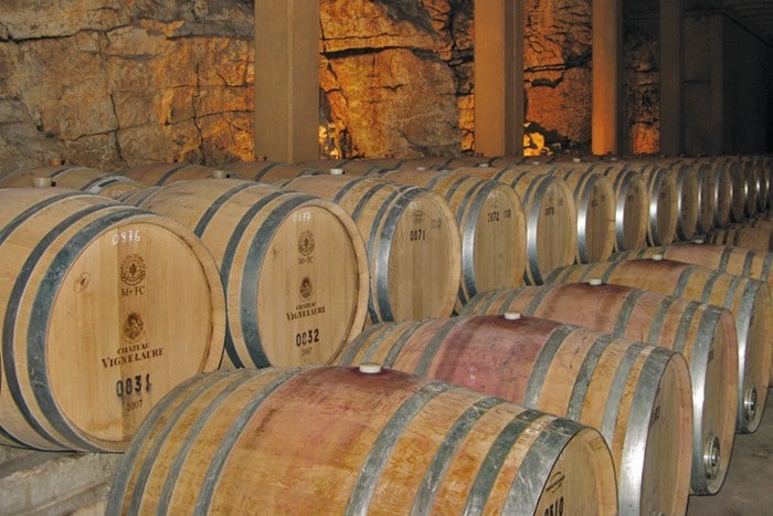 Provence Wine Tour - At Château Vignelaure, Coteaux d’Aix-en-Provence, the wine aging room 700x467