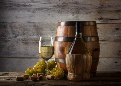 Provence Wine Tours - Cask, glass of white wine and grapes